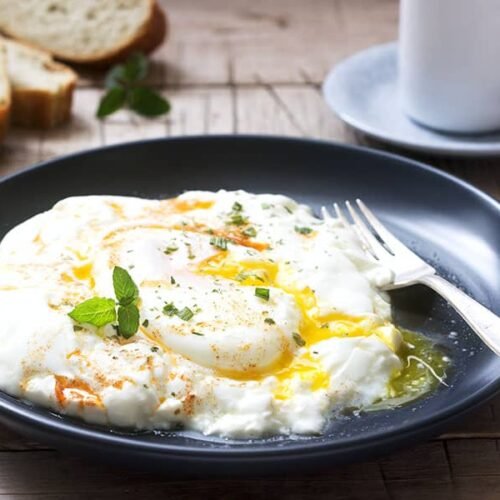 Poached Eggs with Yogurt (Eggs Panagjurischte) Traditional Recipes from the Balkans